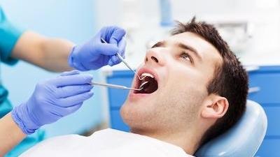 man receiving dental care