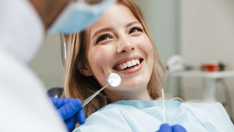 woman sitting in dental chair